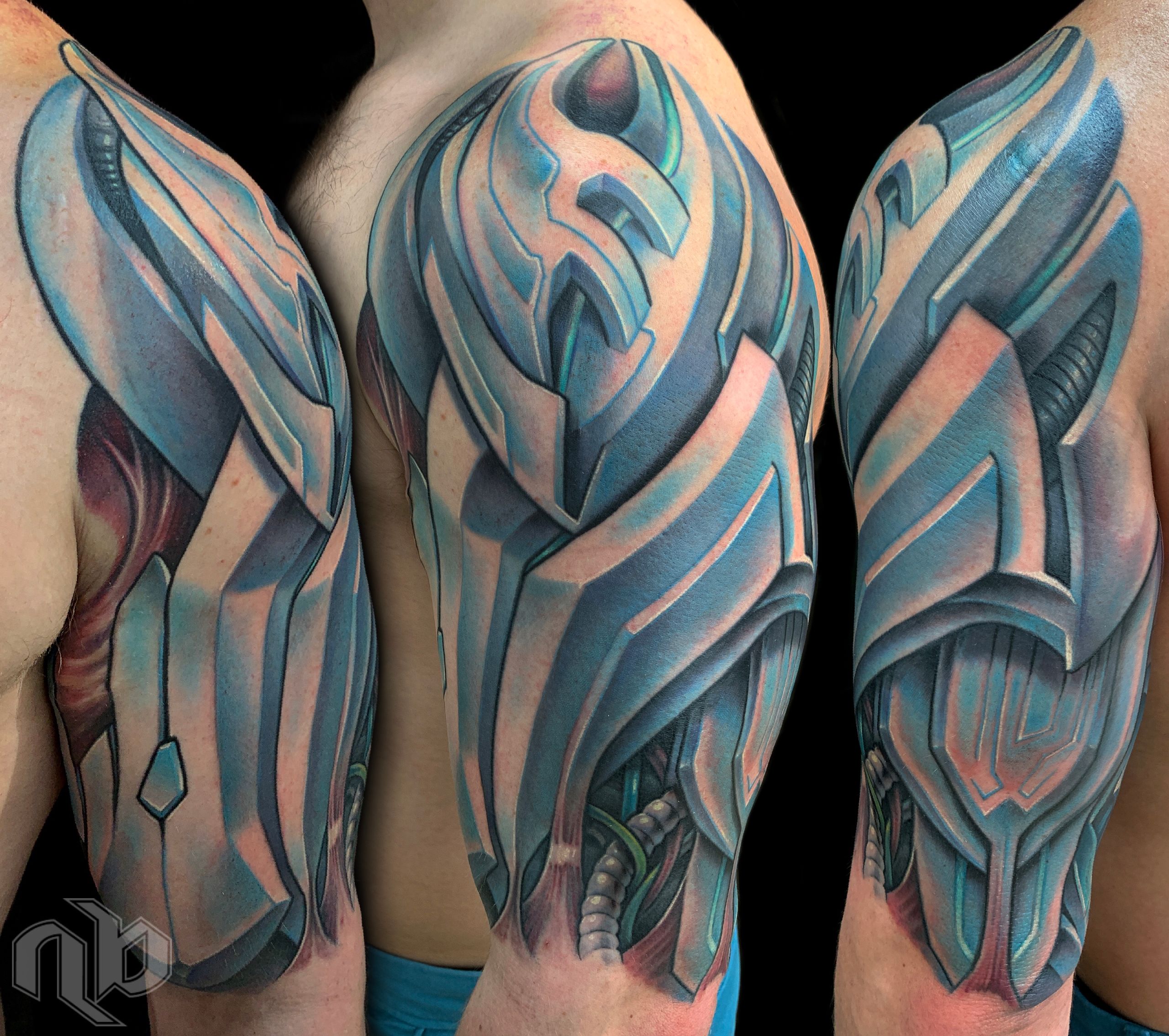 Three close views show a large arm tattoo of layered biomechanical armor forms in blue, teal, grey, and muted pink.