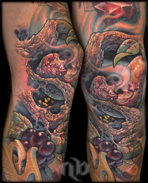 Two side-by-side close views of a colorful leg tattoo depicting rotting fruit, grapes, leaves, and a textured tree branch.
