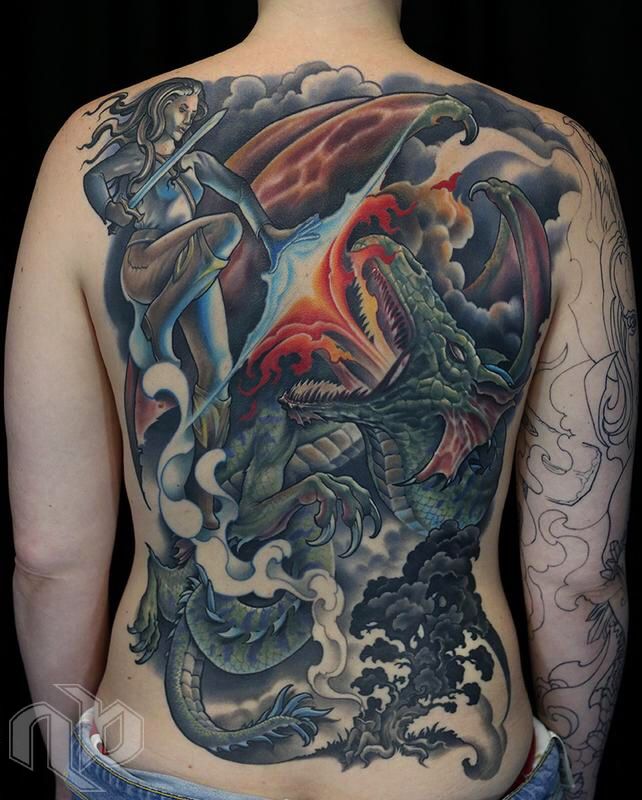 Large full-back tattoo depicting a sword-wielding woman confronting a green dragon amid swirling blue-grey clouds, red flames, and dark waves.