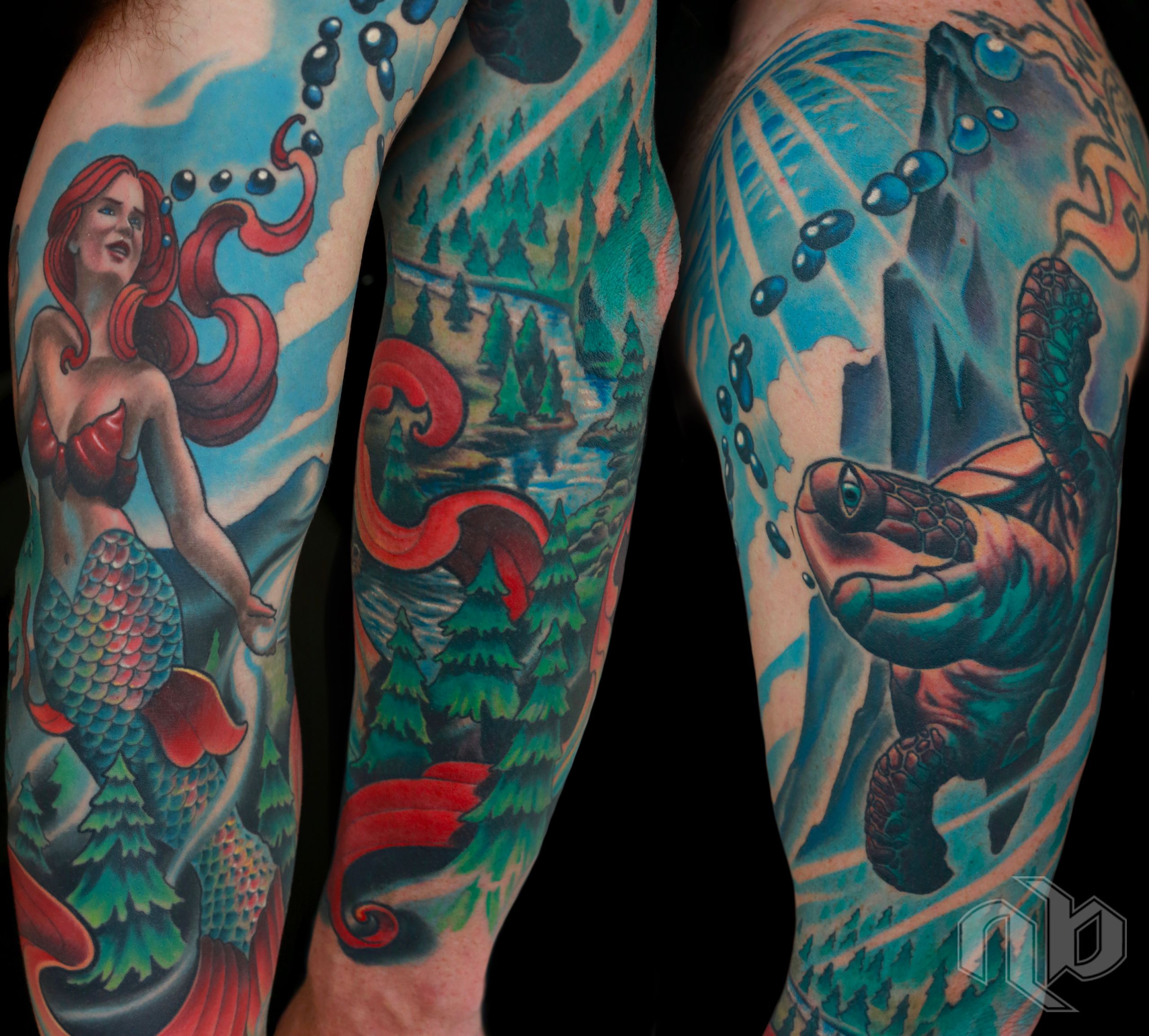 Three views of a large arm tattoo depict a red-haired mermaid, evergreen landscape, and swimming sea turtle in vivid blue, green, and red.