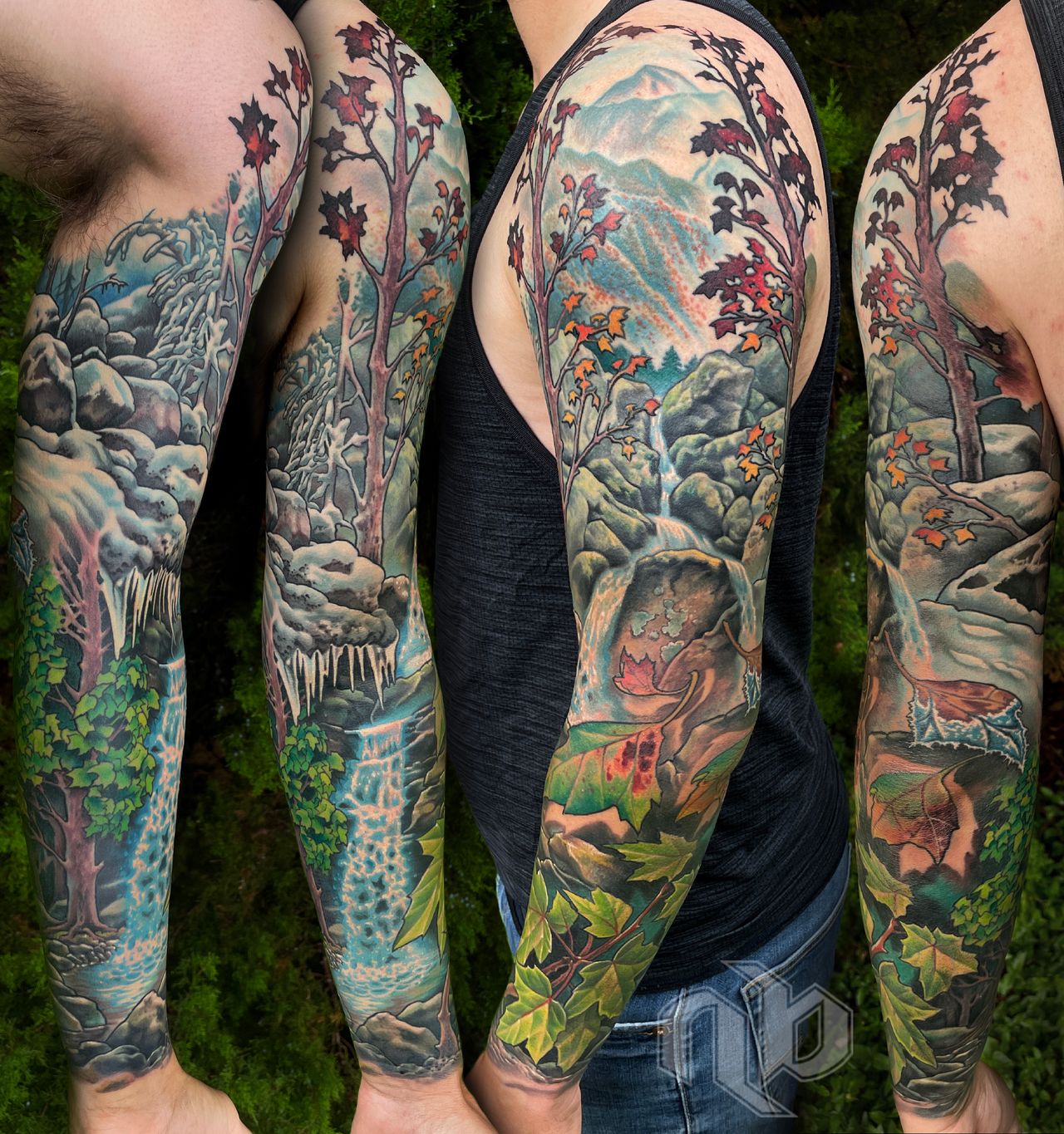 Four views of a large arm tattoo show trees, waterfalls, mountains, snow, autumn leaves, and green foliage in vivid blues and reds.