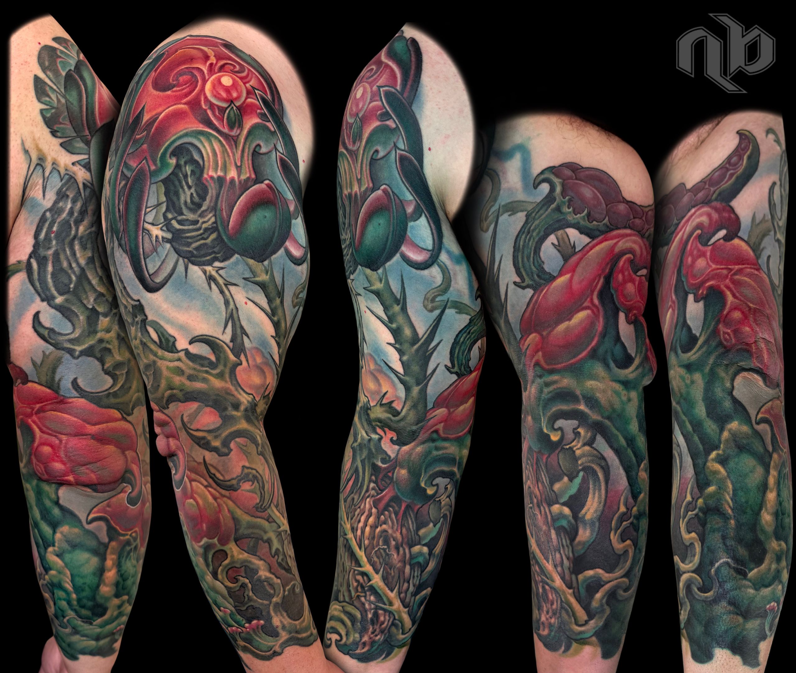 Color textured abstract bio-organic tattoo sleeve with roots, vines, thorns and floral growth by Nick Baxter in Austin Texas