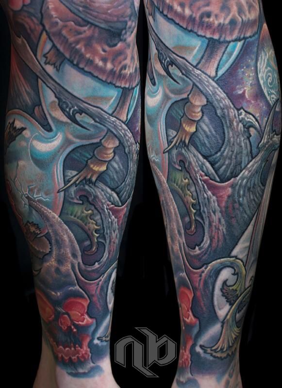 Two side-by-side views show a large leg tattoo with swirling bio-organic vine forms, a broken hourglass, and a skull near the ankle.