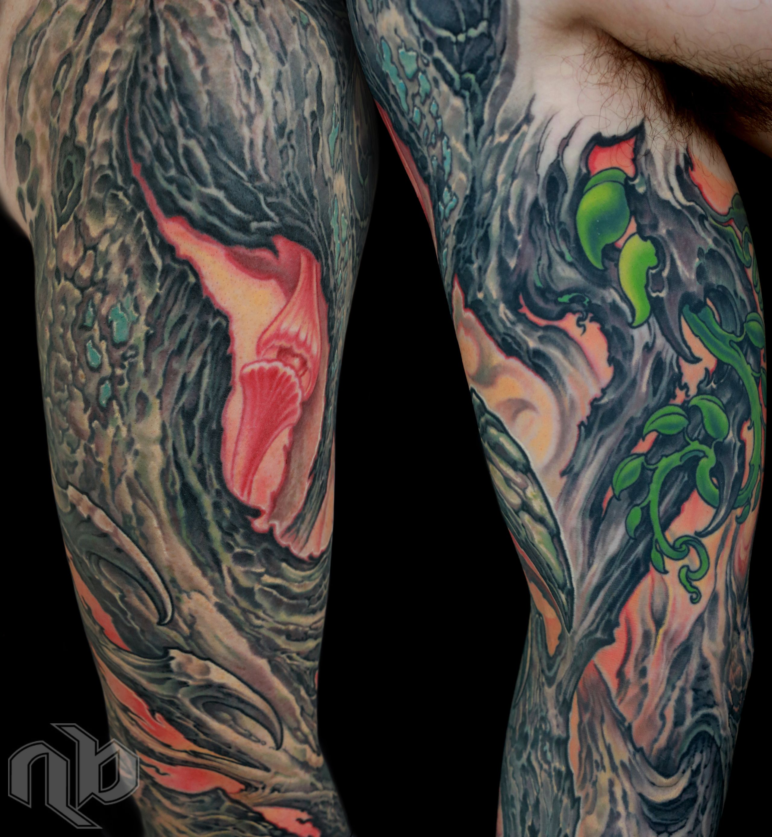 color bio-organic full arm sleeve tattoo of textured tree bark with glowing background by nick baxter in austin texas