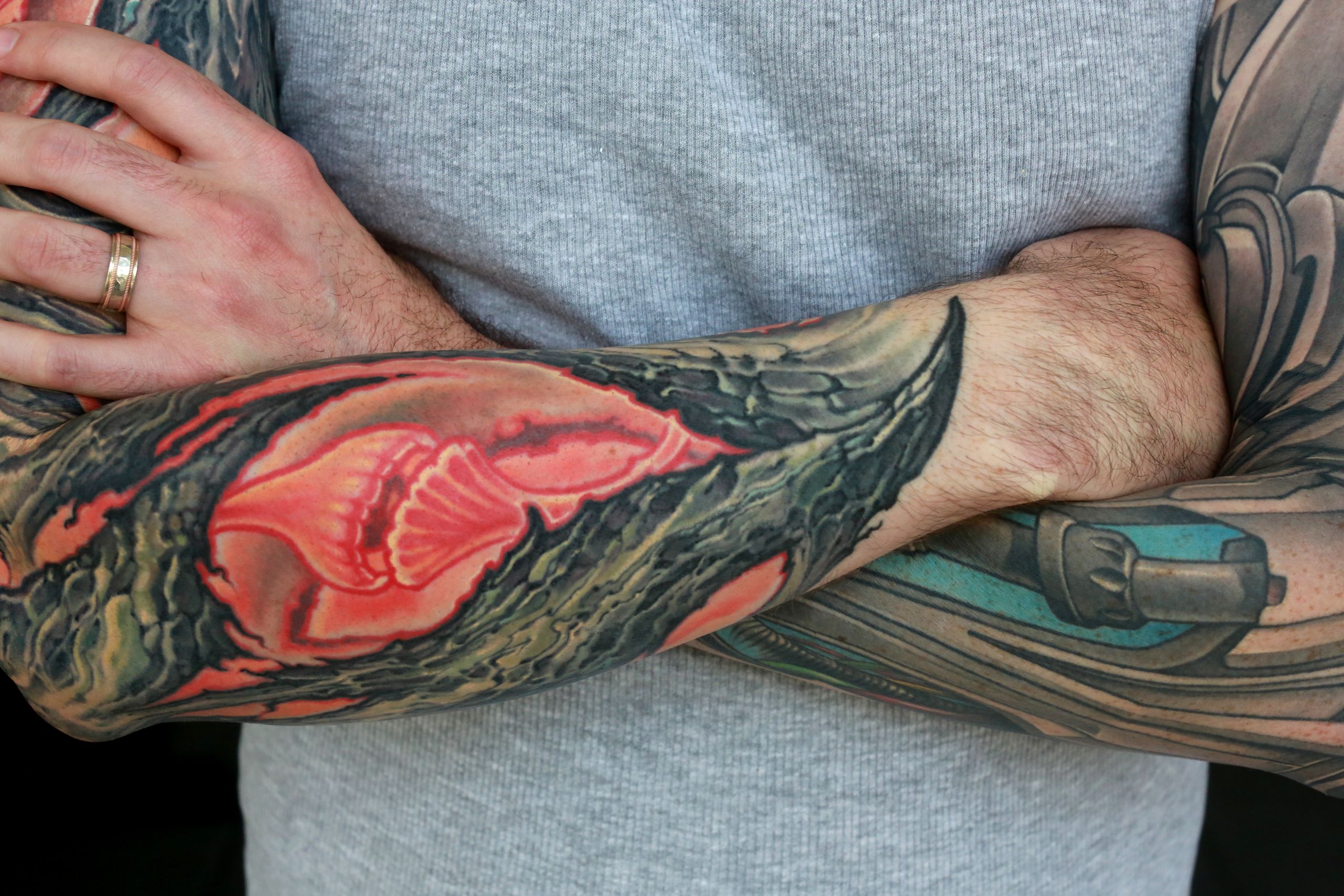 color bio-organic full arm sleeve tattoo of textured tree bark with glowing background by nick baxter in austin texas