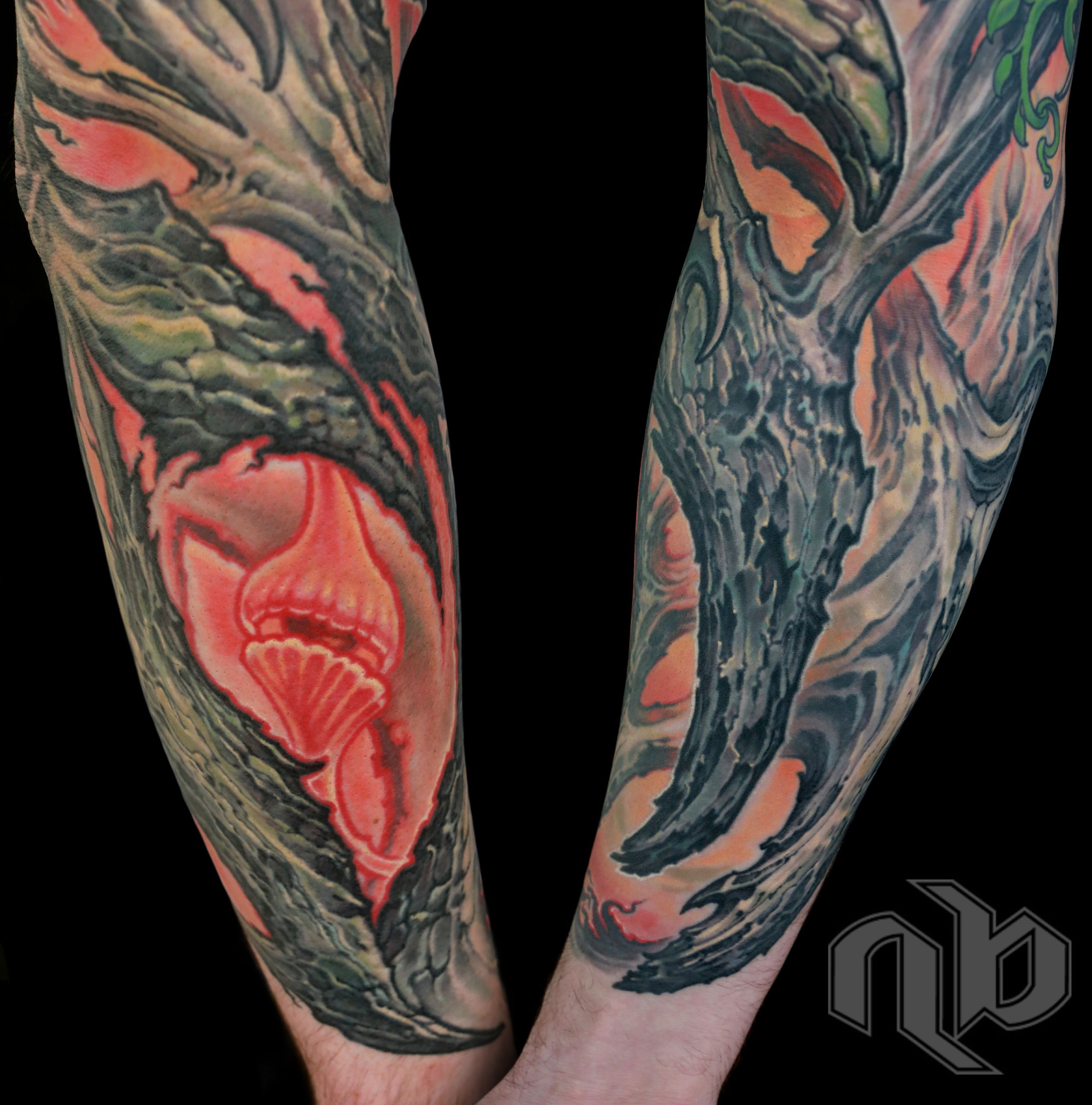 color bio-organic full arm sleeve tattoo of textured tree bark with glowing background by nick baxter in austin texas