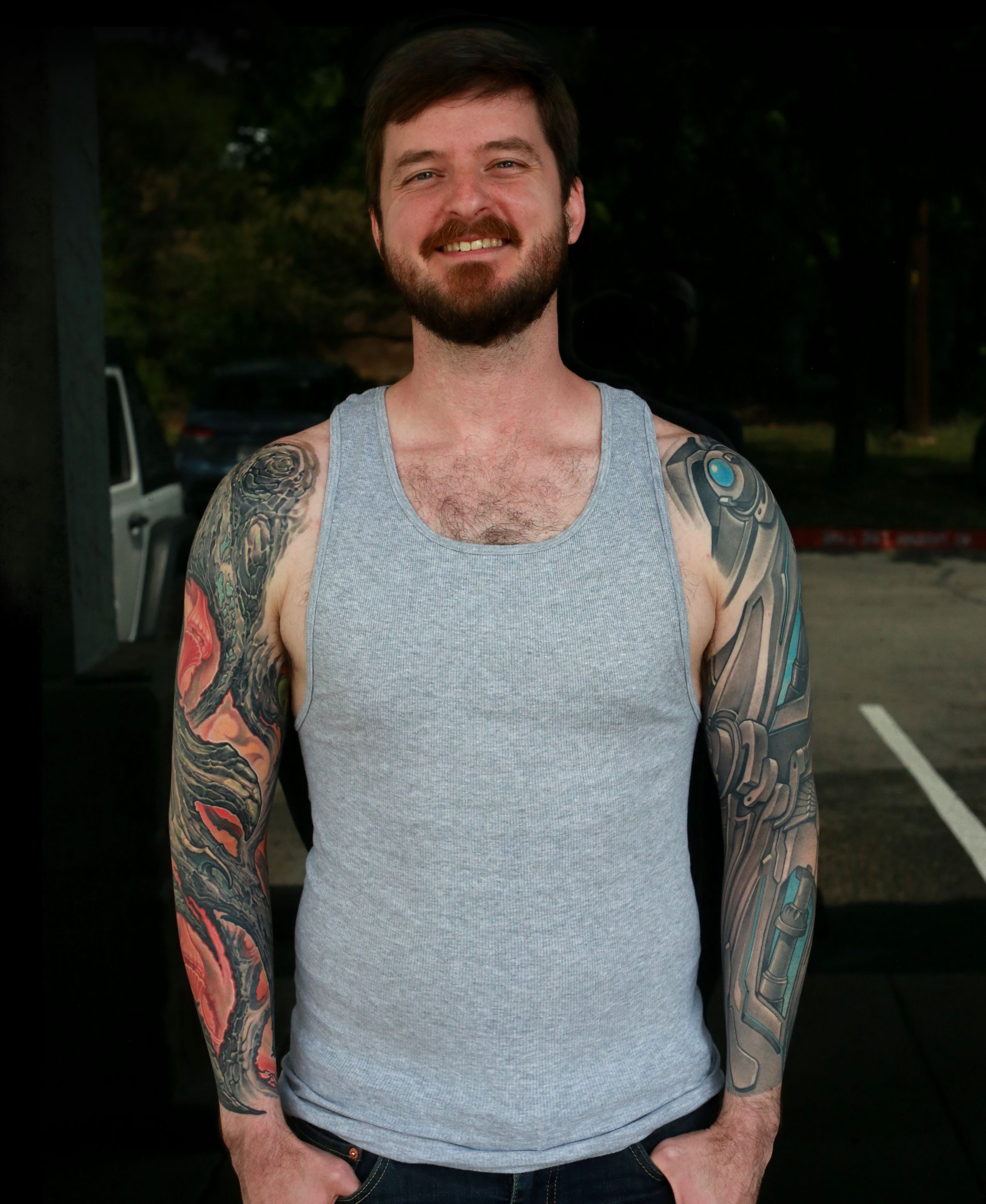 color bio-organic full arm sleeve tattoo of textured tree bark with glowing background by nick baxter in austin texas