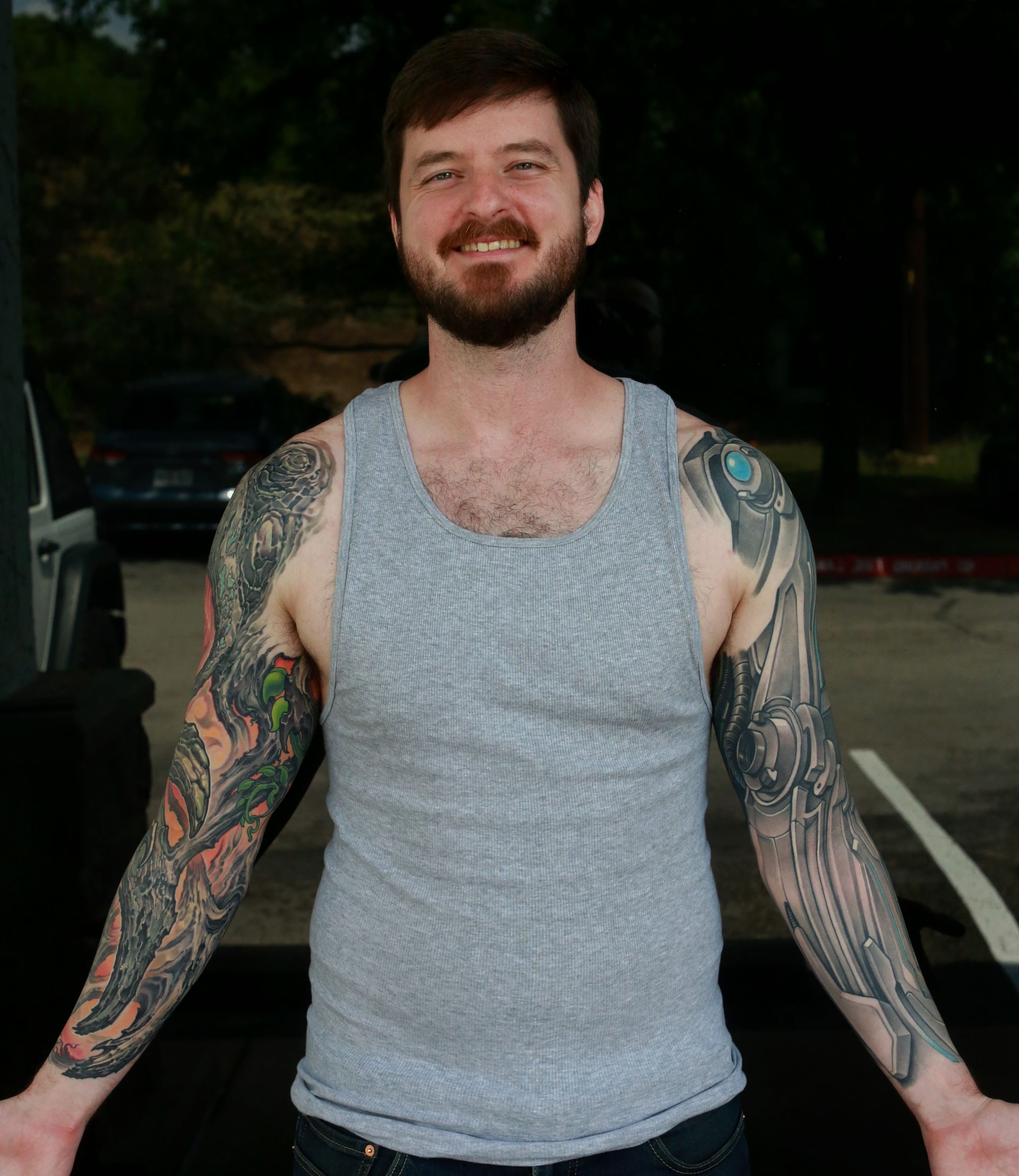 color bio-organic full arm sleeve tattoo of textured tree bark with glowing background by nick baxter in austin texas