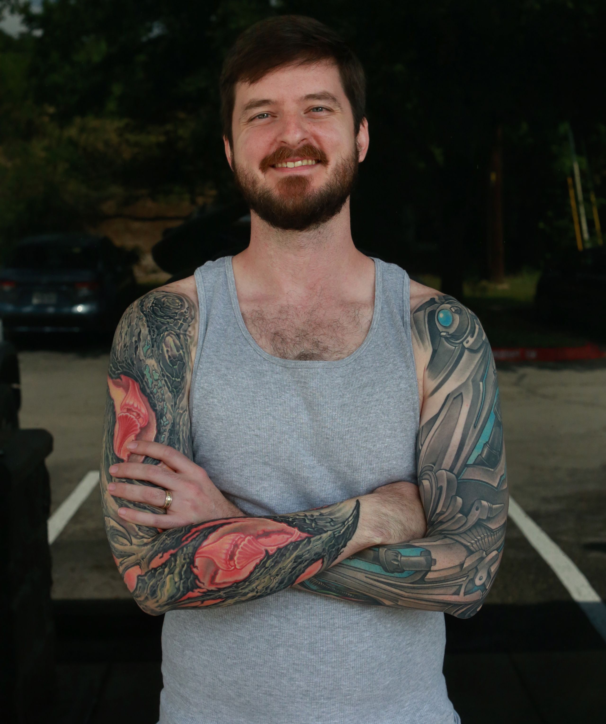 color bio-organic full arm sleeve tattoo of textured tree bark with glowing background by nick baxter in austin texas